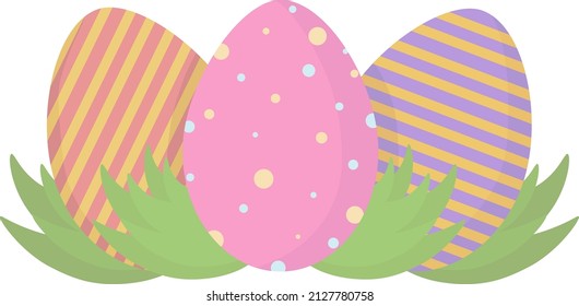 colored Easter eggs in the grass