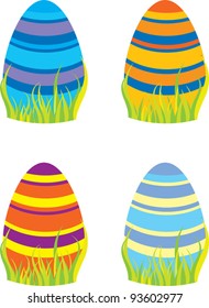 colored Easter eggs in grass