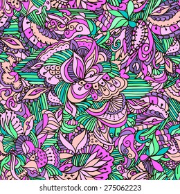 Colored floral seamless pattern. Flowers, leaves, fruit, jungle, tropical. Psychedelic zentangle vector.