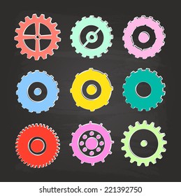 Colored Gear Icons Set On Blackboard
