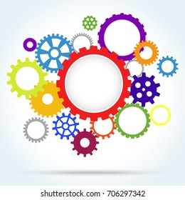 colored gear wheels with big gear in middle for cooperation or teamwork symbolism