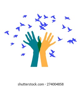 colored hand and a flock of birds