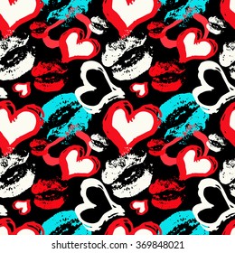 colored hearts and lips on a black background seamless pattern