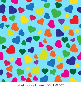 colored hearts on a blue background, seamless texture