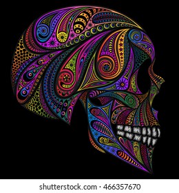 Colored human skull from various patterns on a black background