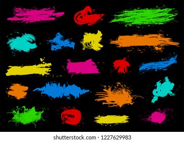 Colored ink splash spots big set isolated on black background. Art brushes pack. Vector illustration