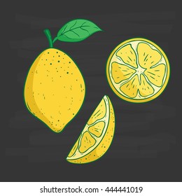 Colored lemon set on chalkboard background