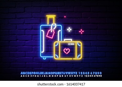 Colored Neon Linear Travel Suitcase With Heart Icon On Brick Background. The Symbol Of The Honeymoon. Luggage Road Sign. Camera Icon.