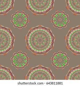 Colored patterns antique.ornament in orange, brown and beige colors. Vector seamless background.