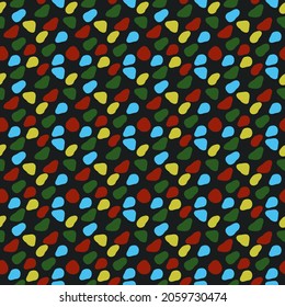 guijarros de colores sobre un fondo negro. El patrón vectorial es simple y sin fisuras. Formas elementales de mosaicos.