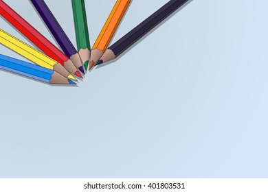 Colored pencils on a blue background
