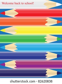 Colored pencils on a blue background form a bright decorative  ornament