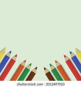 colored pencils on green background