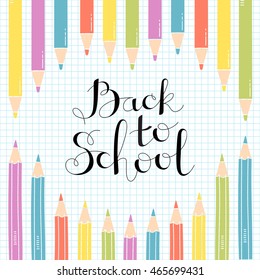 Colored Pencils on notebook sheet with a handwritten inscribed Back to School. Vector Illustration.