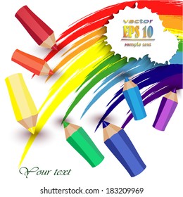 Colored pencils and a rainbow on a white background
