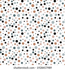 Colored polka dot seamless pattern on a white background. Abstract vector background with dots of different sizes in brown, black, blue, pink, pastel colors. Fabric print texture.