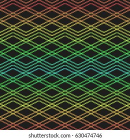 Colored rainbow zigzag seamless pattern. Decorative stripes isolated on black background. Abstract pattern. 