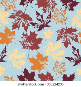  Colored seamless pattern with autumnal maple leaves. Ink collection.