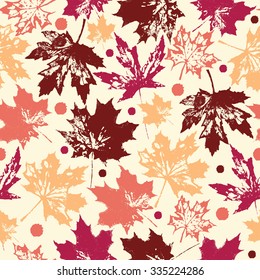  Colored seamless pattern with autumnal maple leaves and dots. Ink collection.