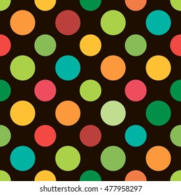 Colored seamless pattern polka dots on black background. Fashion texture with colorful bubbles