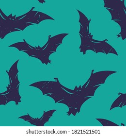 Colored seamless pattern with scary horrible bats for halloween holiday design. October party banner, poster or postcard