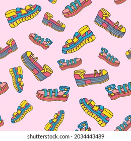 Farbige nahtlose Muster von Schuhdrucken. Vektorgrafik, Design, Doodle.