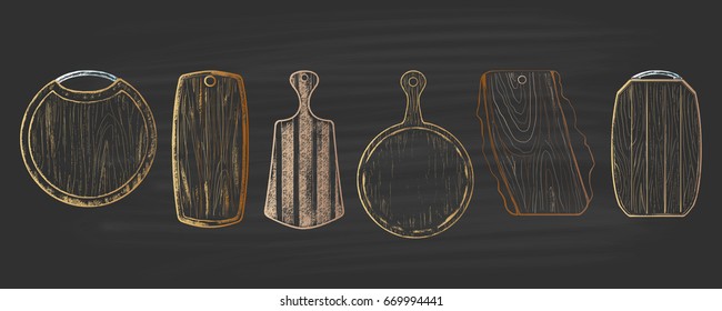 Colored set of cutting boards chalk drawn on blackboard. Kitchen theme.