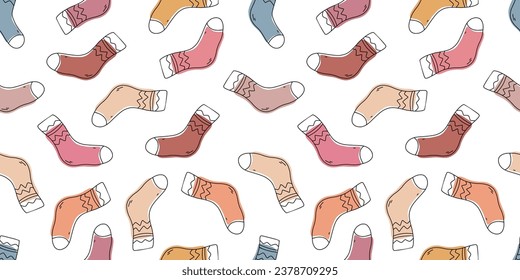 Colored socks seamless pattern. Knitted socks doodle pattern. Doodle autumn winter accessories pattern. Seasonal clothes seamless pattern