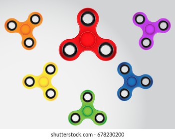 Colored spinners on a gray background