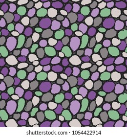 Colored stones on a dark background. Stone texture, colorful  seamless pattern. Good for fabric, wallpaper, and much more.