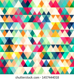 Colored triangle seamless pattern with grunge effect.