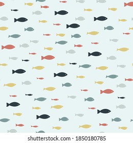 Colored tropical fish vector seamless pattern on a white background. Underwater world.