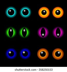 colored vector eyes on black background