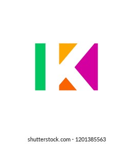 Colored vector letter K. Geometric negative space alphabet. Colorful symbol on blank background with geometric confetti. Monogram template.