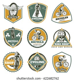 Colored vintage biking labels set with cyclists bicycles skull chain sprockets wheels sport equipment isolated vector illustration