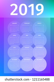 Colorful 2019 calendar of translucent circles on a neon glowing background. Week starts on Sunday. EPS 10 Vector.