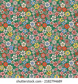 Colorful 60s -70s style retro hand drawn floral pattern. Multicolored flowers. Vintage seamless vector background. Hippie style, print for fabric, swimsuit, fashion prints and surface design. Stock.