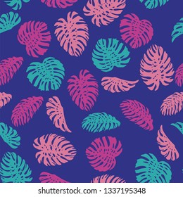 Colorful abstract color tropical leaves monstera seamless vector pattern on the blue background. Fresh contemporary composition