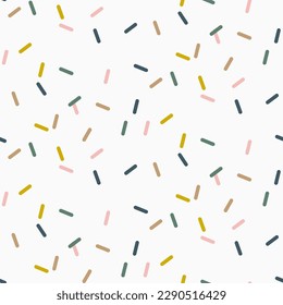 Colorful abstract confetti sprinkles seamless pattern background.