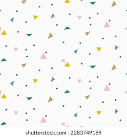 Colorful abstract confetti triangles seamless pattern background.