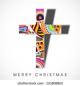 Colorful abstract decorated Christian Cross on abstract grey background for Merry Christmas celebration. 