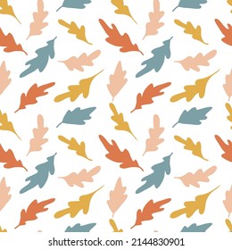 Colorful abstract leaves seamless pattern. Blue, yellow and terracotta boho floral vector illustration.