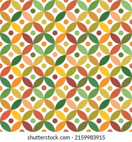 Colorful abstract mid century modern circle pattern with little dots in green, orange, amber, yellow and red on white background. for wallpaper, home décor, textures and gift wrapping paper.  