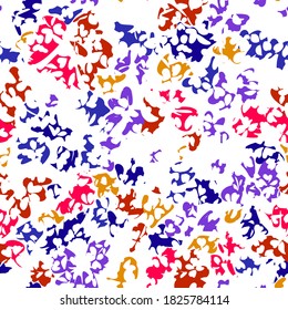 Colorful abstract seamless pattern. Simple geometric ragged cut shapes torn small paper pieces. Modern creative style.