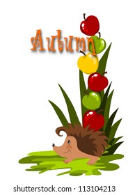 Colorful apples and happy hedgehog on the green grass.