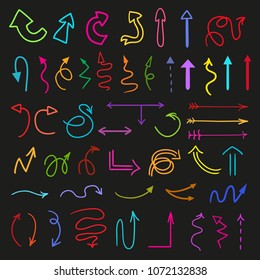 Colorful arrows on isolation black background. Collection of infographic elements. Hand drawn multicolored signs