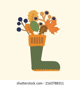 Colorful autumn leaves bouquet in gum boot vector illustration. Cute cartoon fall shoe cozy drawings