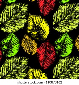 Colorful autumn leaves prints on black seamless pattern, vector