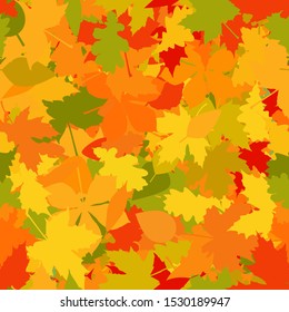 Colorful autumn leaves - seamless pattern. Abstract natural background. Bright autumn colors - yellow, red, gold, orange. Repeating forest texture for camouflage and clothing. Maple, oak, birch leaves