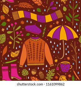 Colorful autumn seamless pattern. Cute background with autumn elements: clothes, umbrella, autumn leaves, forest tree branches